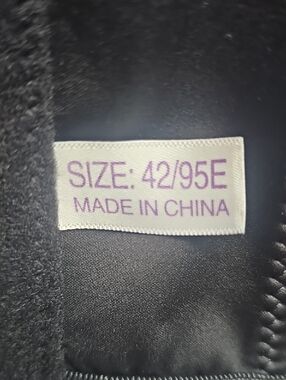 Black Jacket with Purple Size Tag (42/95E)